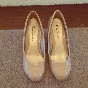 Almost New nude patent leather pumps CL